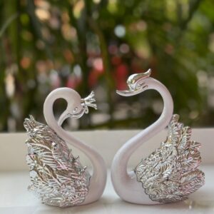 PAIR OF SWAN SILVER